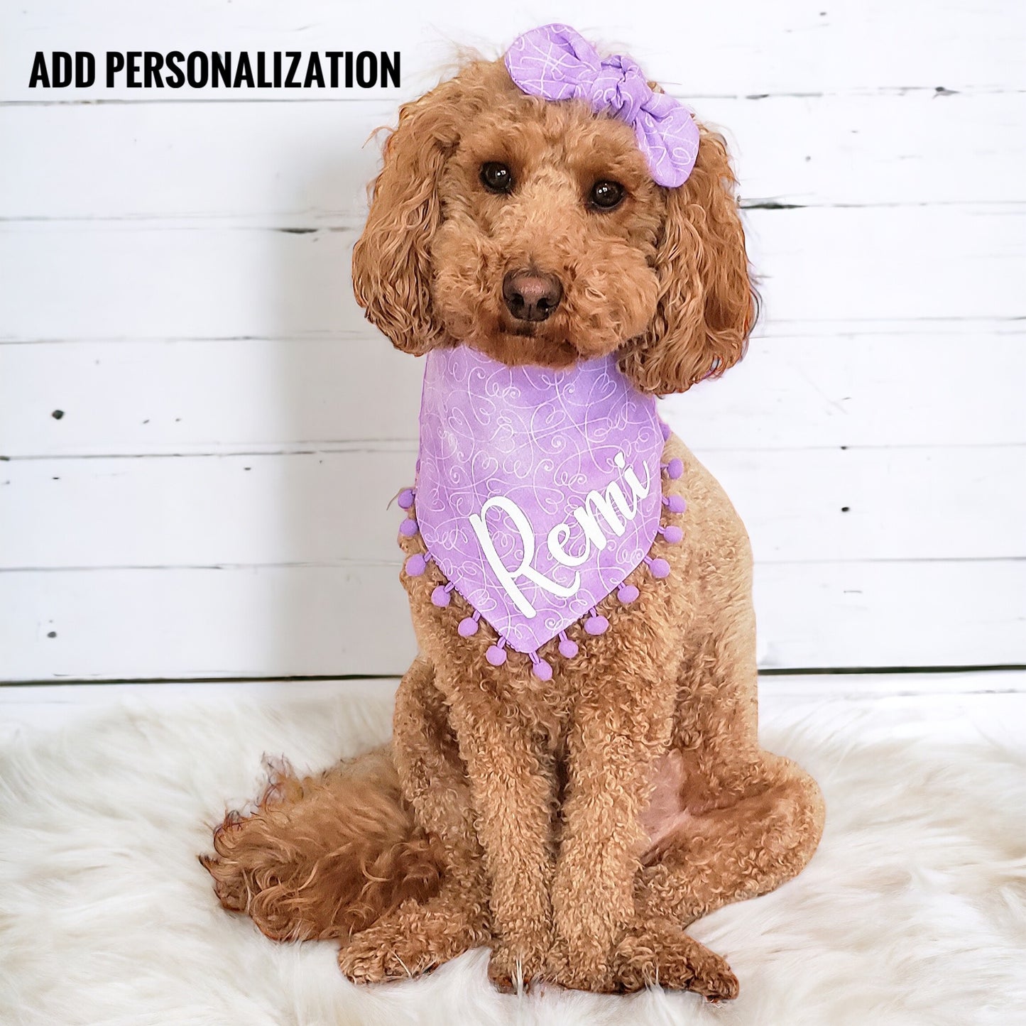 Side view of small dog modeling handmade lavender ruffle dog bandana with pom poms
